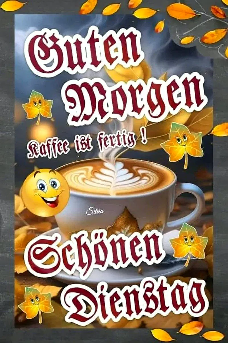 Ein dampfender Kaffeebecher mit filigraner Latte Art, umgeben von leuchtend gold-orangen Herbstblättern. Ein fröhliches Smiley lächelt neben dem Spruch „Guten Morgen! Kaffee ist fertig! Schönen Dienstag“ auf dem gemütlichen Bild.