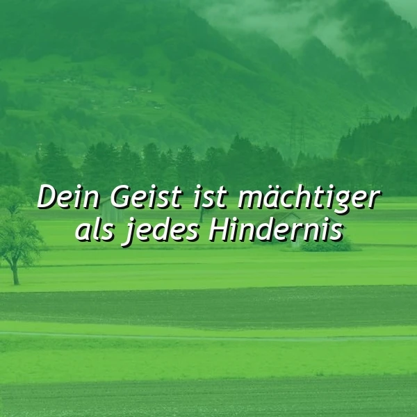 Ein grünes Feld mit einem Baum und einem Berg im Hintergrund. Der Text 'Dein Geist ist mächtiger als jedes Hindernis' ist über das Bild gelegt.
