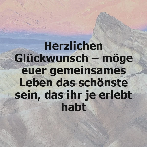 Textbild mit dem herzlichen Glückwunsch-Spruch: ‚Möge euer gemeinsames Leben das schönste sein, das ihr je erlebt habt‘. Im Hintergrund zeigen sich sanfte Berggipfel in warmen Erdtönen, die eine friedliche und hoffnungsvolle Atmosphäre schaffen.
